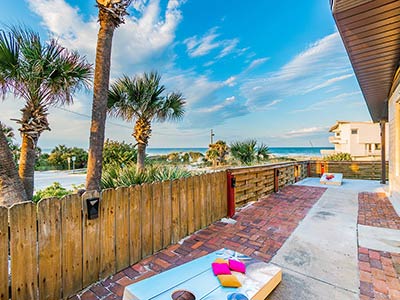 corn hole looking out at the beach